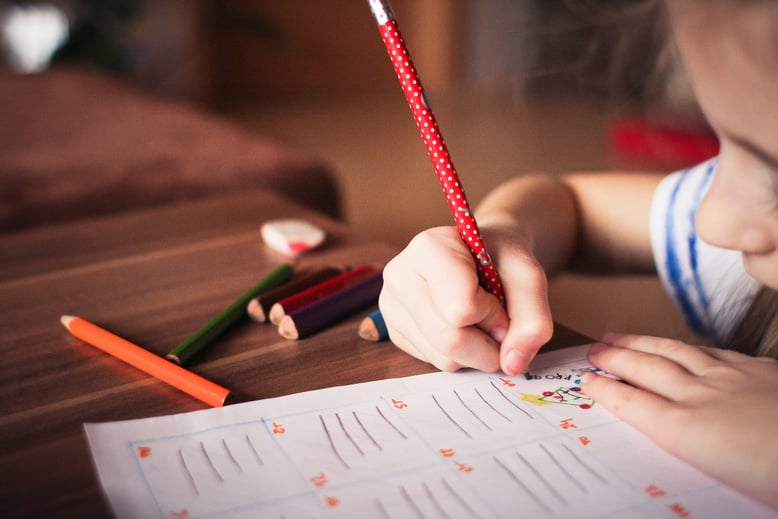 Little Girl Practicing How to Write